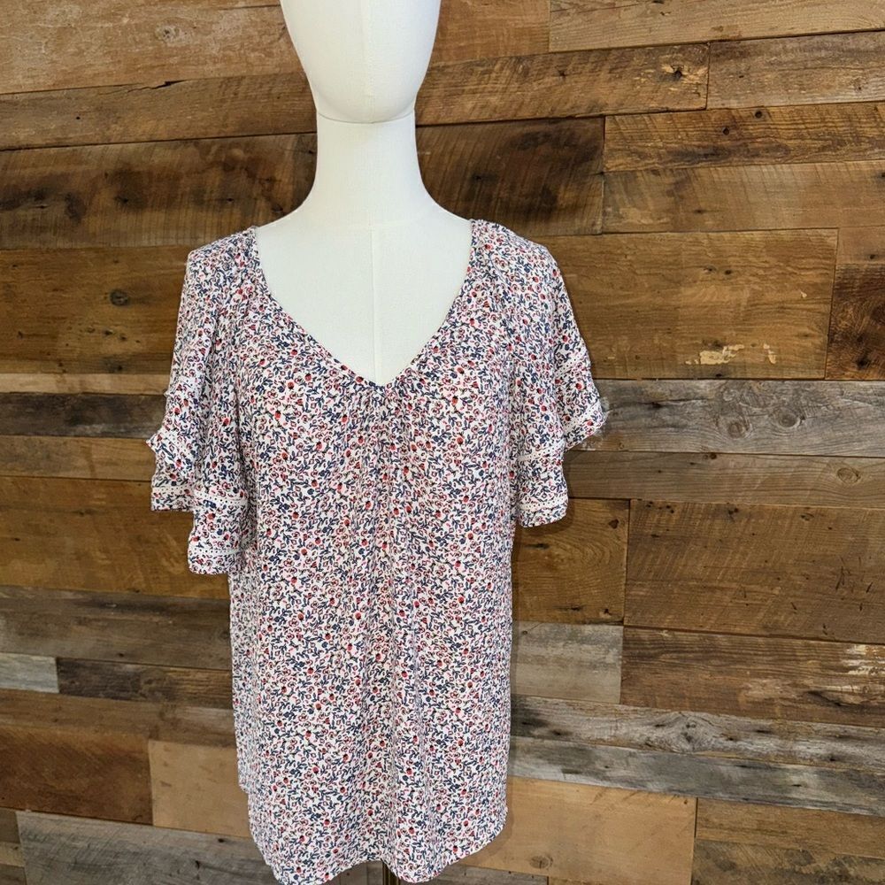 Loft butterfly sleeves perfect this flowy top with  easy-going touch of romance.